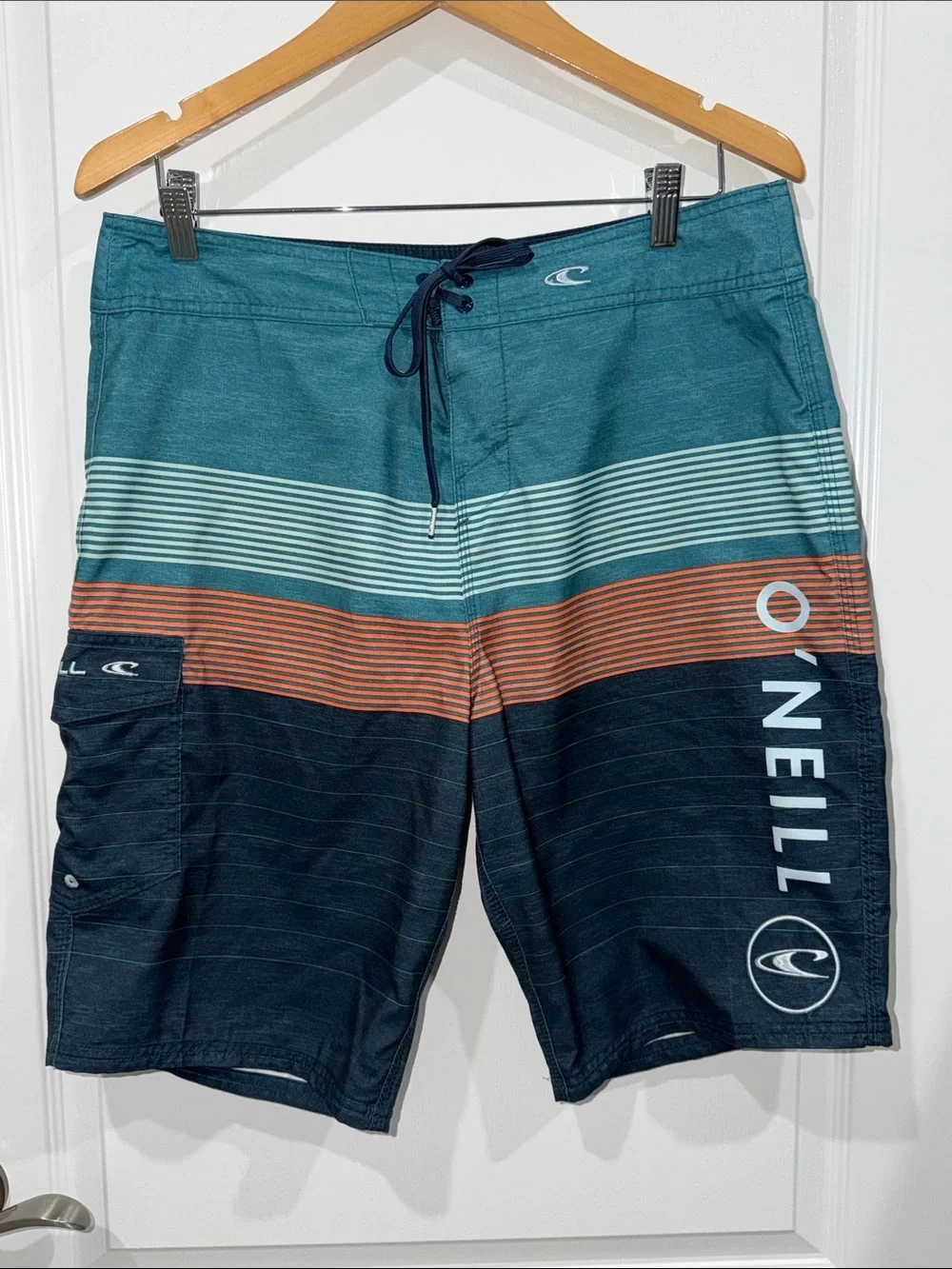 O'Neill Teal, Navy & Orange Striped Men's Boardshorts size 33” vacation beach